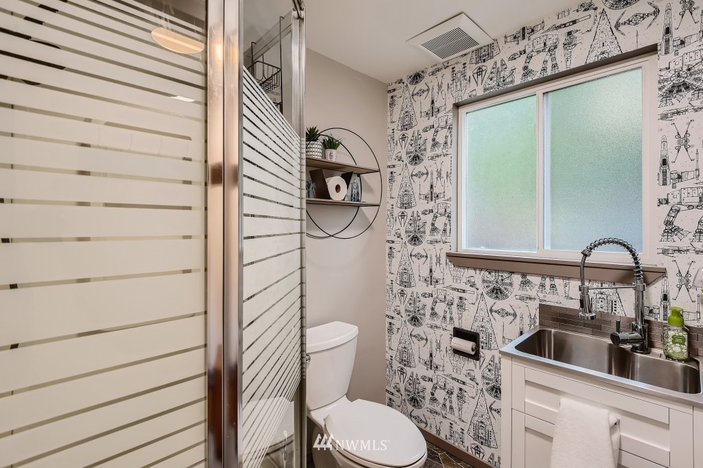 22420 61st Avenue Southeast Bothell, WA 98021 - Photo 28 of 39 a bathroom with a toilet sink and shower