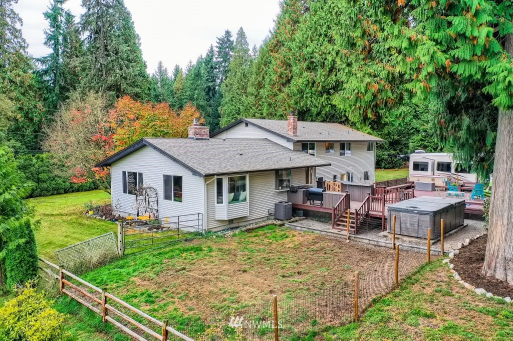 22420 61st Avenue Southeast Bothell, WA 98021 - Photo 33 of 39 a view of a house with a yard patio and sitting area