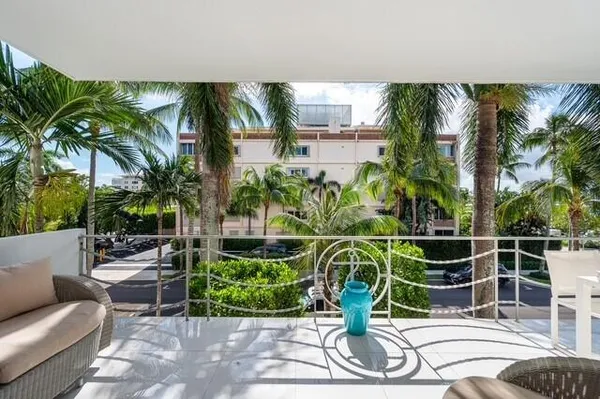 a view of a backyard with a patio