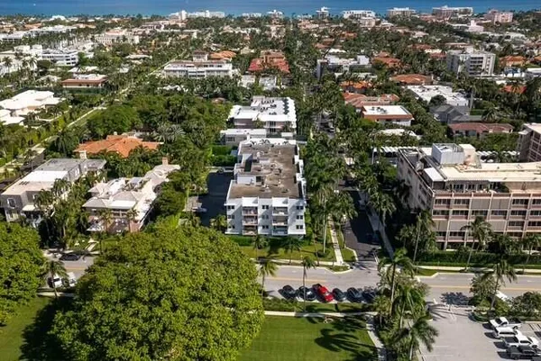 an aerial view of a house with a lake view