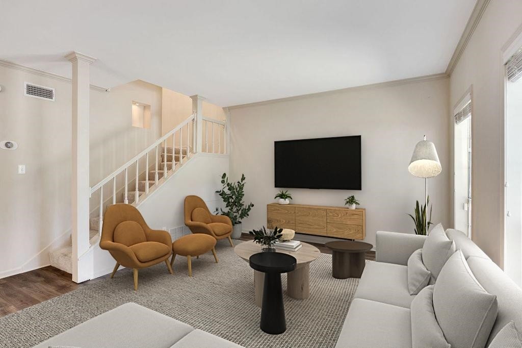 1836 Kimbrough Road Memphis, TN 38138 - Photo 6 of 16 a living room with furniture and a flat screen tv