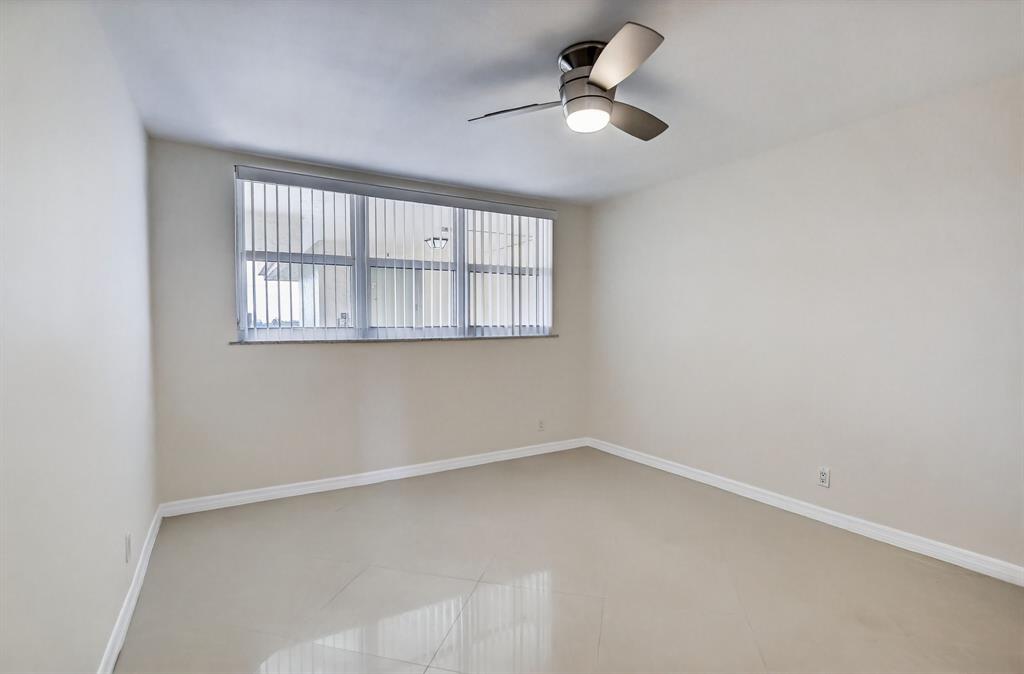 5321 Northeast 24th Terrace, Unit 504A Fort Lauderdale, FL 33308 - Photo 12 of 35 an empty room with a window