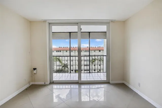 a very nice looking dining room with a large window