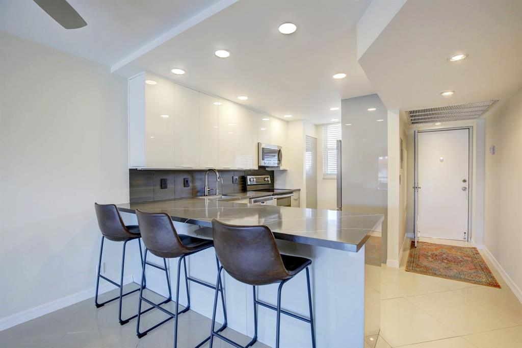 5321 Northeast 24th Terrace, Unit 504A Fort Lauderdale, FL 33308 - Photo 20 of 35 a view of a dining room with furniture