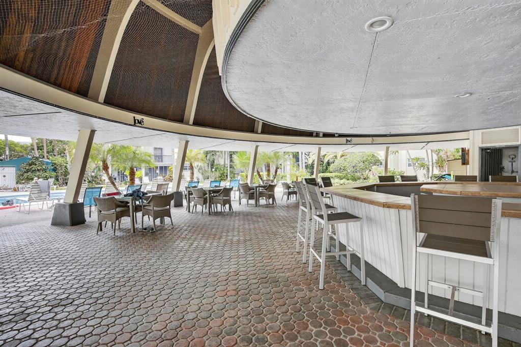 5321 Northeast 24th Terrace, Unit 504A Fort Lauderdale, FL 33308 - Photo 26 of 35 a very nice looking dining room with a large window