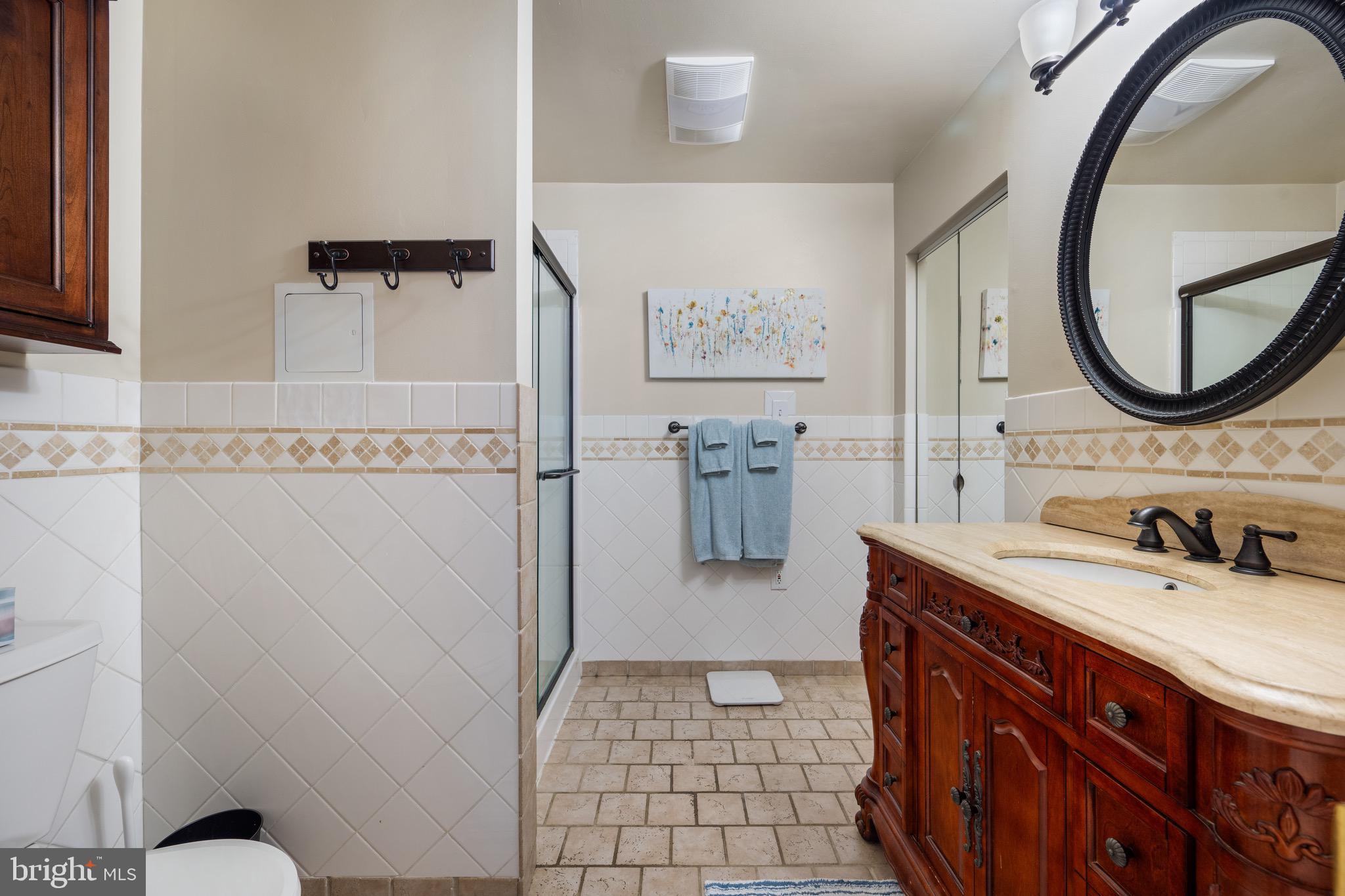 458 Radix Road Williamstown, NJ 08094 - Photo 28 of 48 a bathroom with a sink a mirror and a toilet