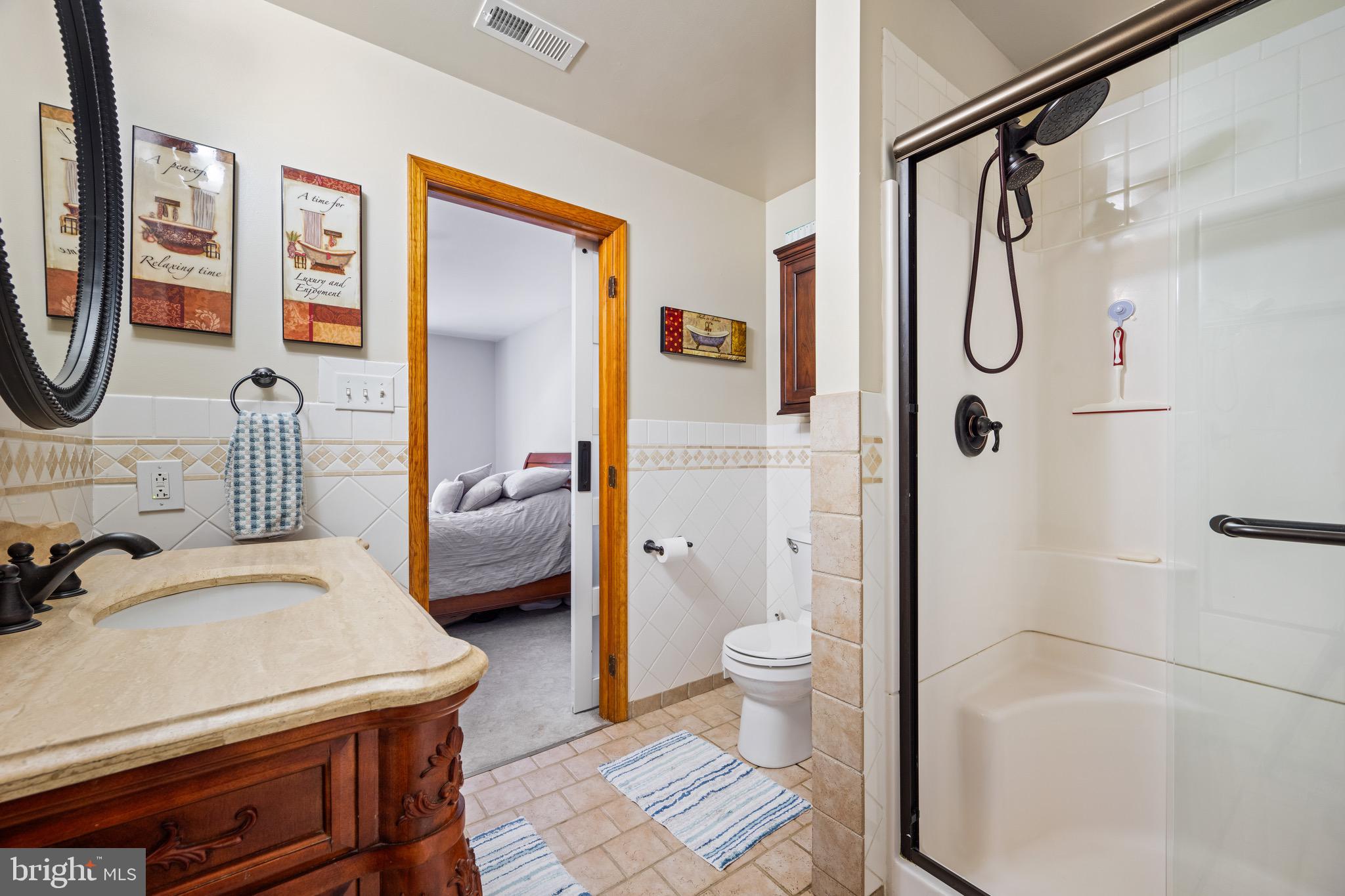 458 Radix Road Williamstown, NJ 08094 - Photo 30 of 48 a bathroom with a shower a toilet and a shower