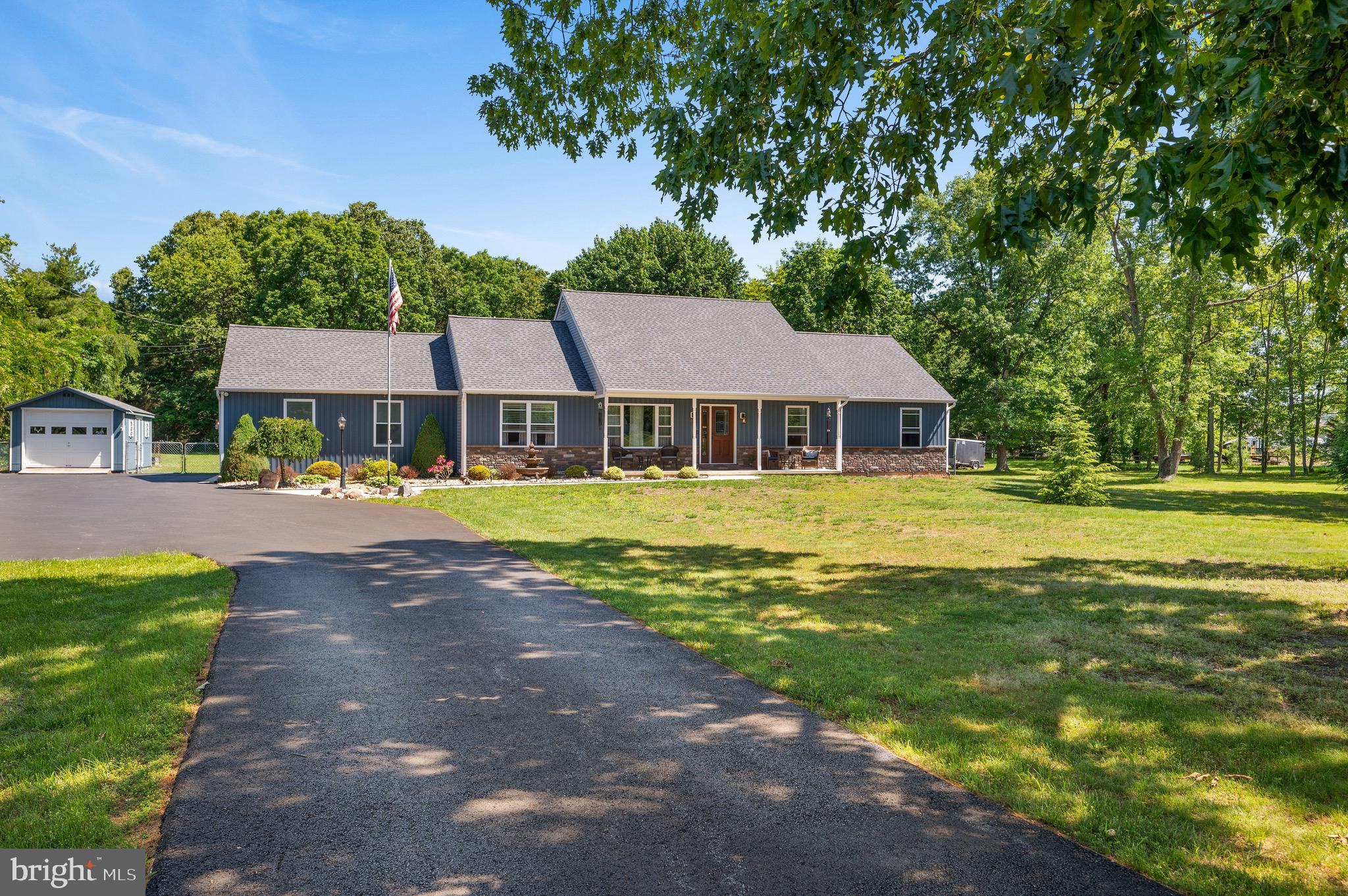458 Radix Road Williamstown, NJ 08094 - Photo 4 of 48 a front view of a house with garden
