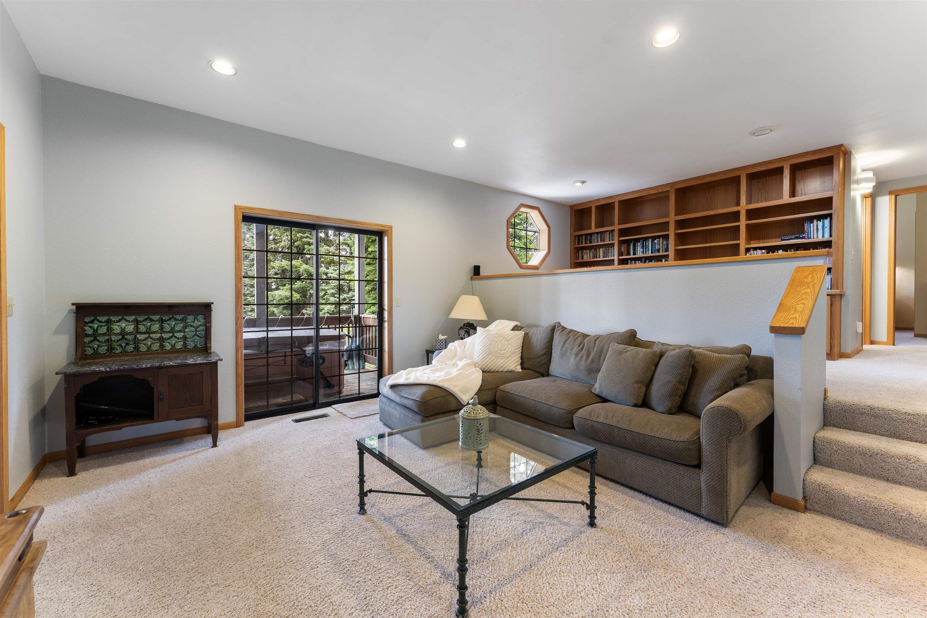 12185 Ski Slope Way Truckee, CA 96161 - Photo 14 of 27 a living room with furniture and a fireplace