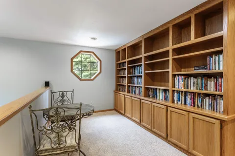 a view of a workspace with furniture
