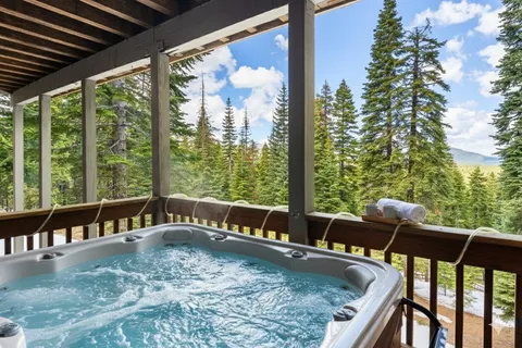 a view of a two chairs in the balcony