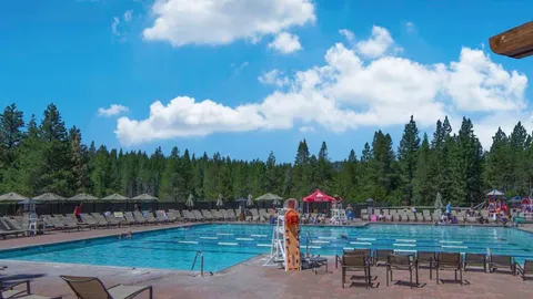 a view of a golf course with a fountain