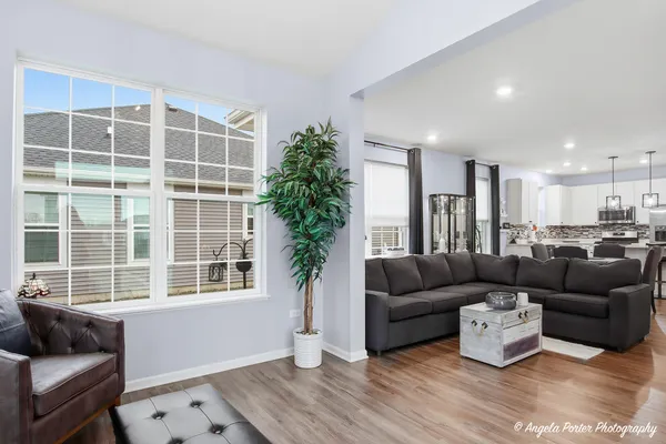 a living room with furniture and a window