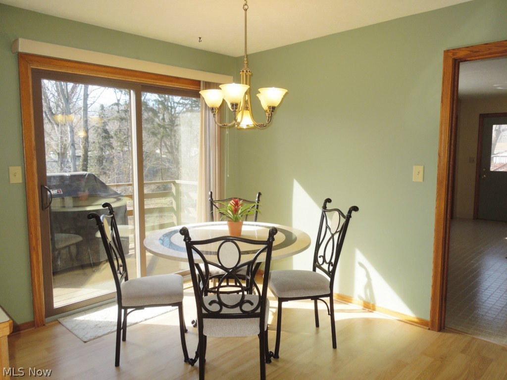 3824 Greentree Road Stow, OH 44224 - Photo 8 of 24 Eat in kitchen area with newer slider that leads to small deck/balcony perfect for grilling!