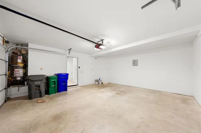 front view of a house with a garden