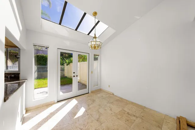 a view of a hallway with a living room