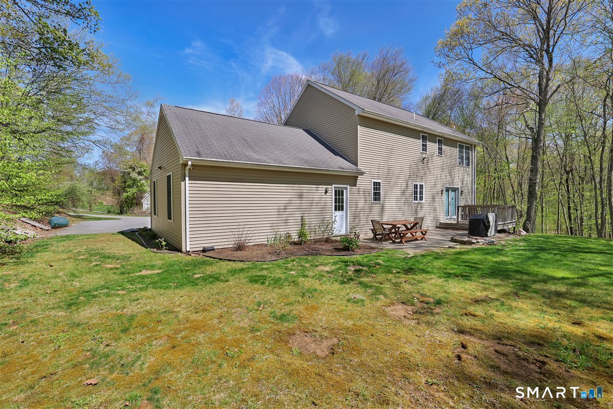 345 Hebron Road Andover, CT 06232 - Photo 31 of 39 a view of backyard of house with green space