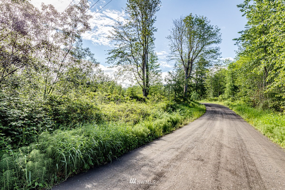 9999 Chicken Coop Road Sequim, WA 98382 - Photo 5 of 30 a view of a garden with a trees