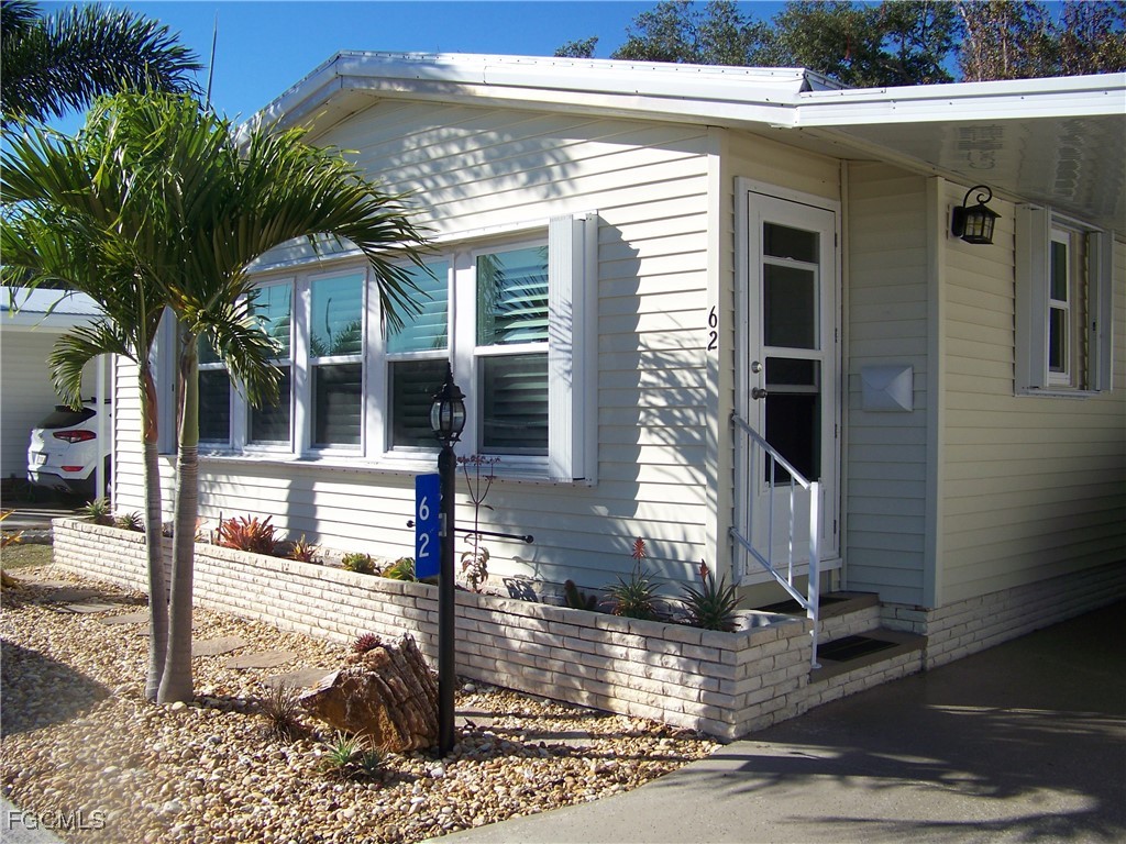 15550 Burnt Store Road, Unit 62 Punta Gorda, FL 33955 - Photo 2 of 50 a front view of a house with street view
