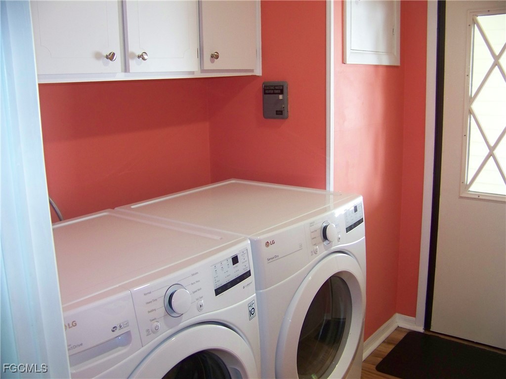 15550 Burnt Store Road, Unit 62 Punta Gorda, FL 33955 - Photo 25 of 50 a close up view of washer and dryer