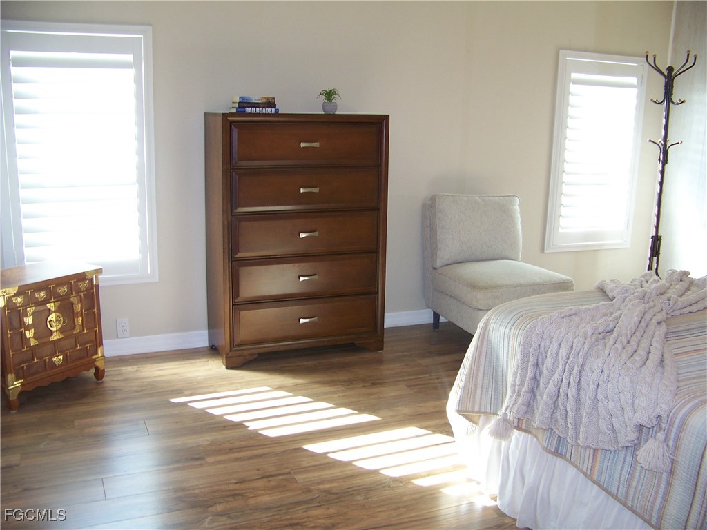 15550 Burnt Store Road, Unit 62 Punta Gorda, FL 33955 - Photo 26 of 50 a bedroom with a bed and a window