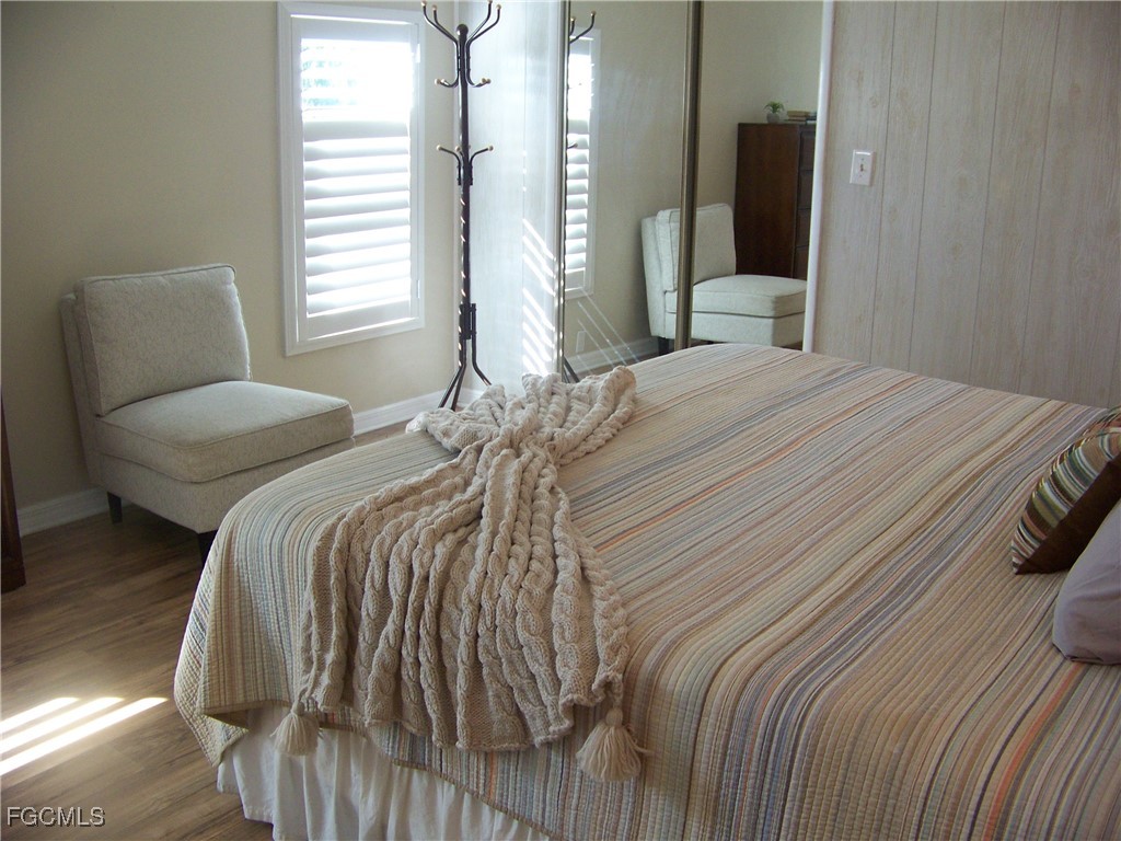 15550 Burnt Store Road, Unit 62 Punta Gorda, FL 33955 - Photo 27 of 50 a bedroom with a bed and a window