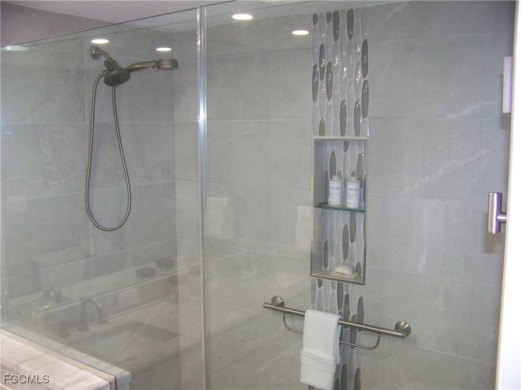 15550 Burnt Store Road, Unit 62 Punta Gorda, FL 33955 - Photo 35 of 50 a bathroom with a shower