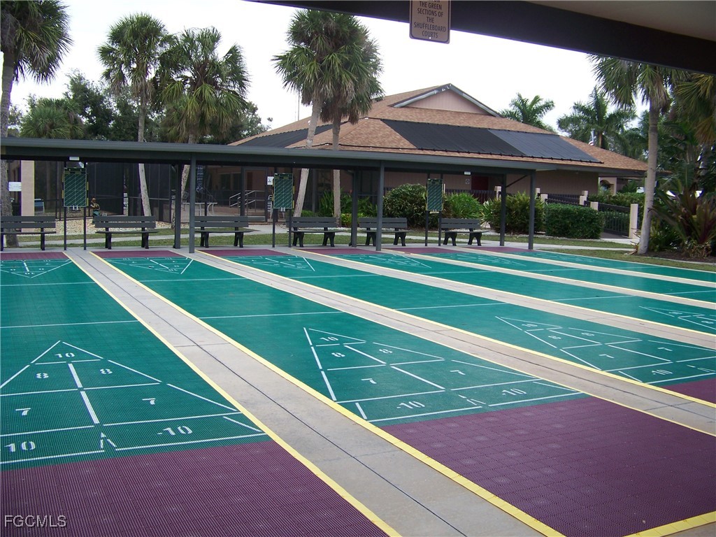 15550 Burnt Store Road, Unit 62 Punta Gorda, FL 33955 - Photo 47 of 50 a view of a swimming pool with a patio