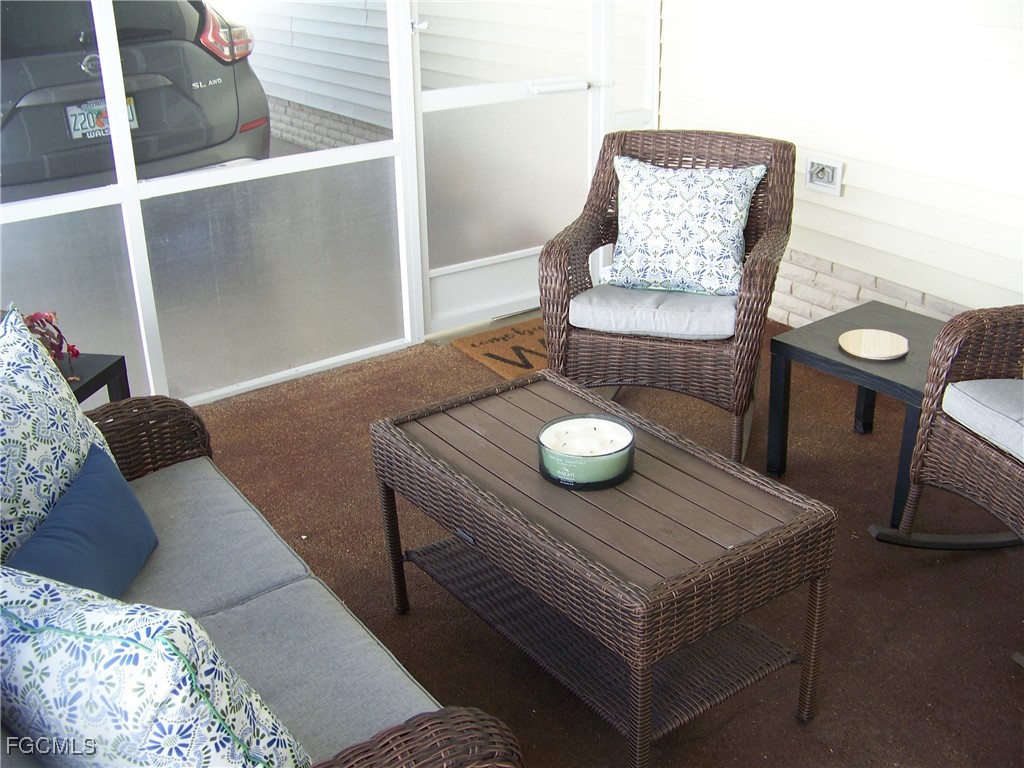 15550 Burnt Store Road, Unit 62 Punta Gorda, FL 33955 - Photo 5 of 50 a living room with furniture