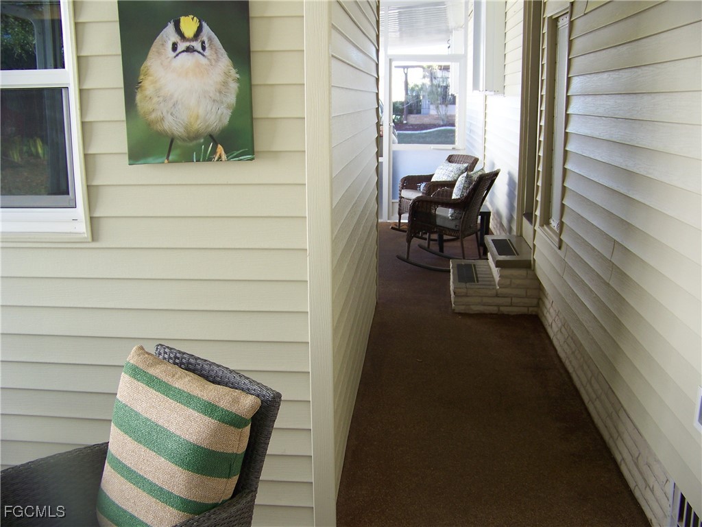 15550 Burnt Store Road, Unit 62 Punta Gorda, FL 33955 - Photo 6 of 50 a view of a balcony with chairs