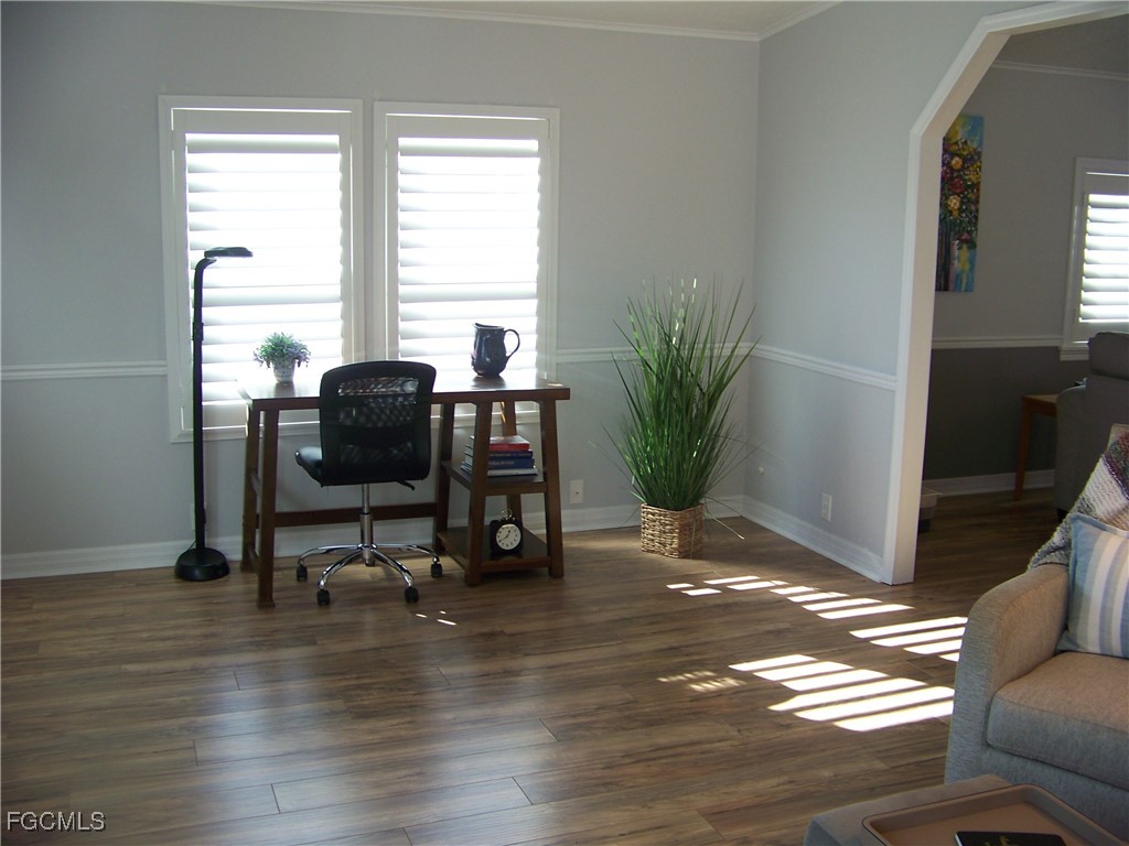 15550 Burnt Store Road, Unit 62 Punta Gorda, FL 33955 - Photo 10 of 50 a view of a workspace with furniture and a window