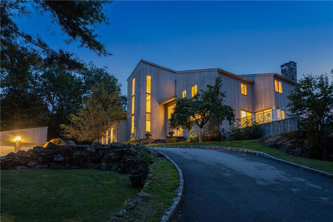 100 Chestnut Ridge Road Bedford, NY 10549 - Photo 1 of 1 a front view of a house with a yard