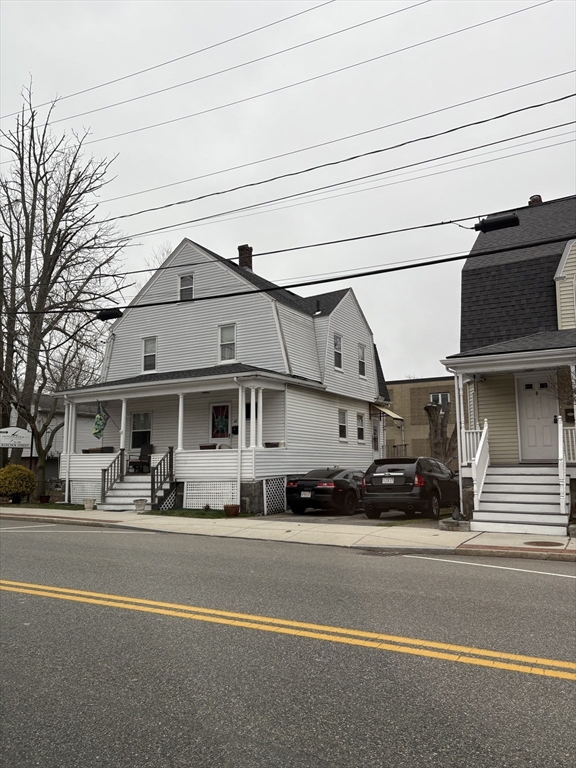 a view of street with parked cars