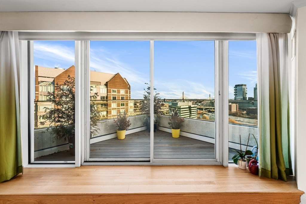 8 Museum Way, Unit 2304 Cambridge, MA 02141 - Photo 6 of 39 a view of a living room and window