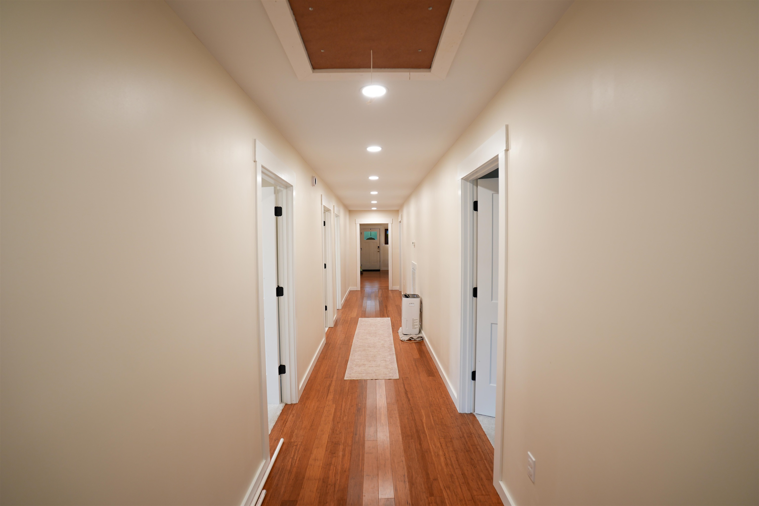 2525 Pittman Road Somerville, TN 38068 - Photo 10 of 38 Hallway with wood-finish flooring, recessed lighting, and white trim