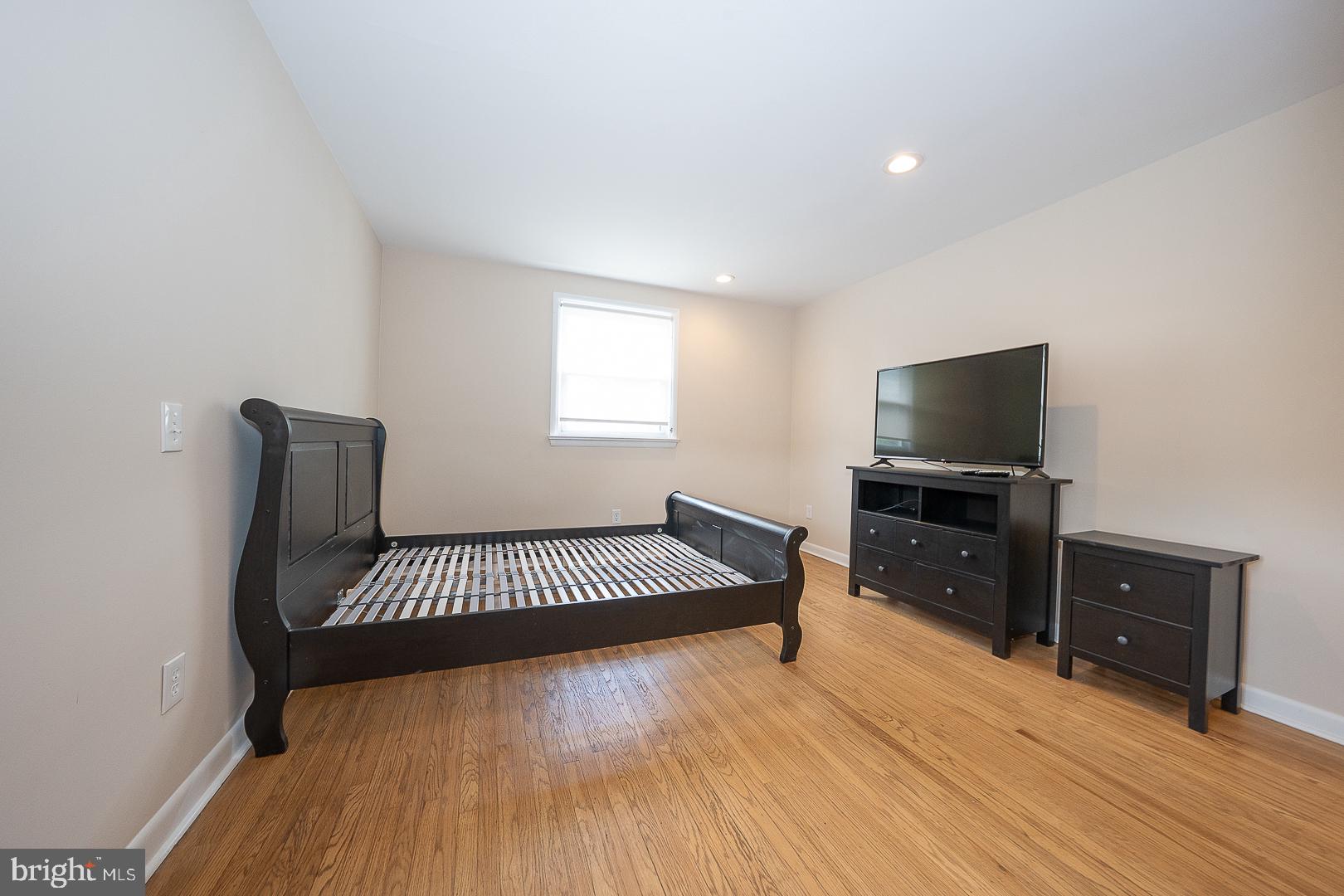20 Fairview Road Swarthmore, PA 19081 - Photo 26 of 57 a living room with furniture and a flat screen tv