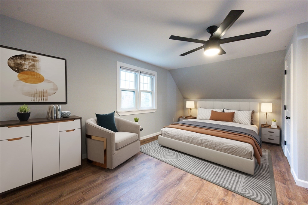 841 Lincoln Street Franklin, MA 02038 - Photo 13 of 25 a bedroom with a bed and a large window