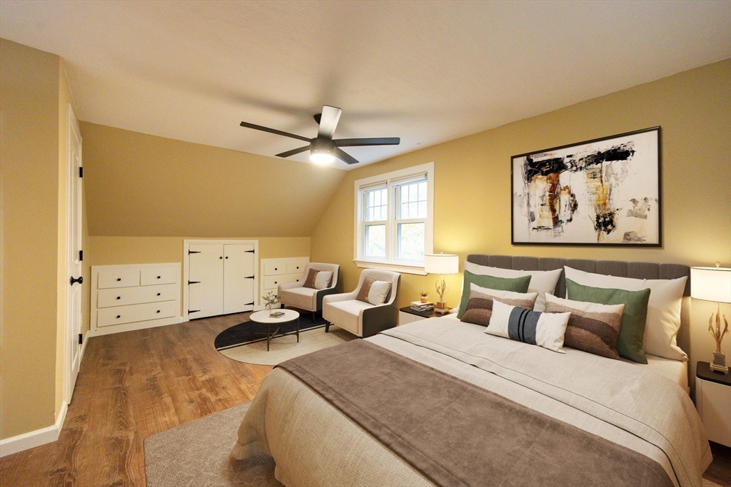 841 Lincoln Street Franklin, MA 02038 - Photo 16 of 25 a spacious bedroom with a bed and window