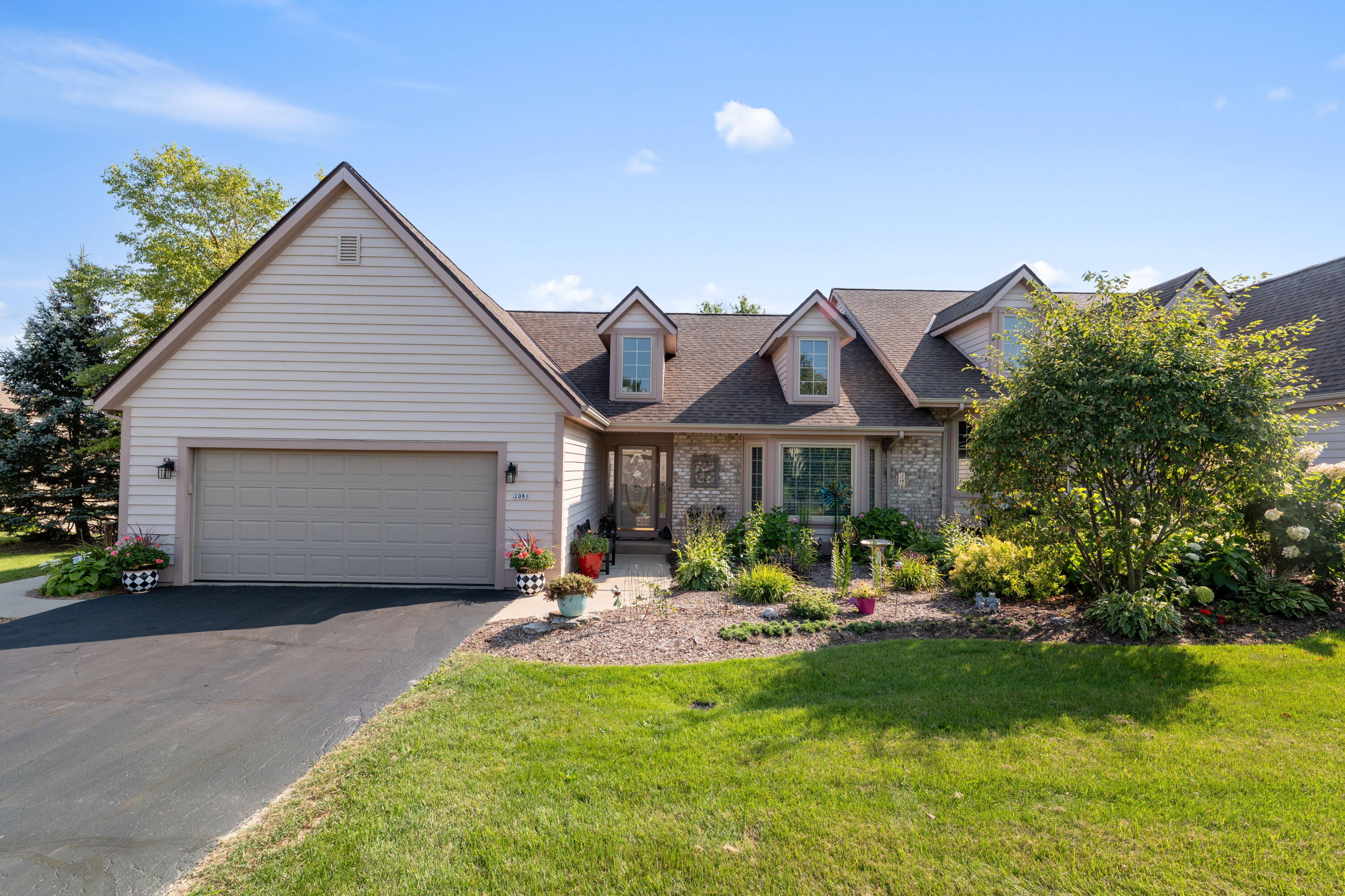 2081 Upper Ridge Road Port Washington, WI 53074 - Photo 1 of 32 This beautifully updated side by side ranch style condo is nestled within a stunning 42 acre natural setting with paths, wildlife, and scenic vista views.