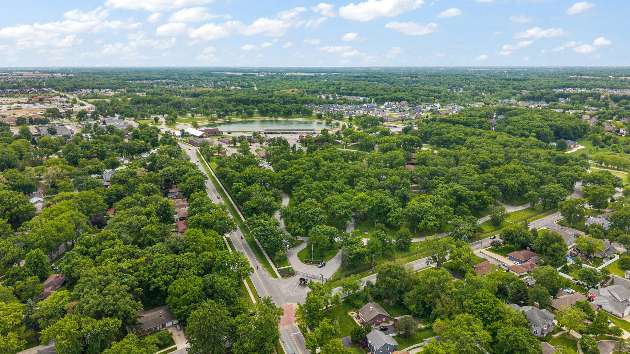 504 South Court Street Crown Point, IN 46307 - Photo 52 of 61 a view of a city with lush green forest