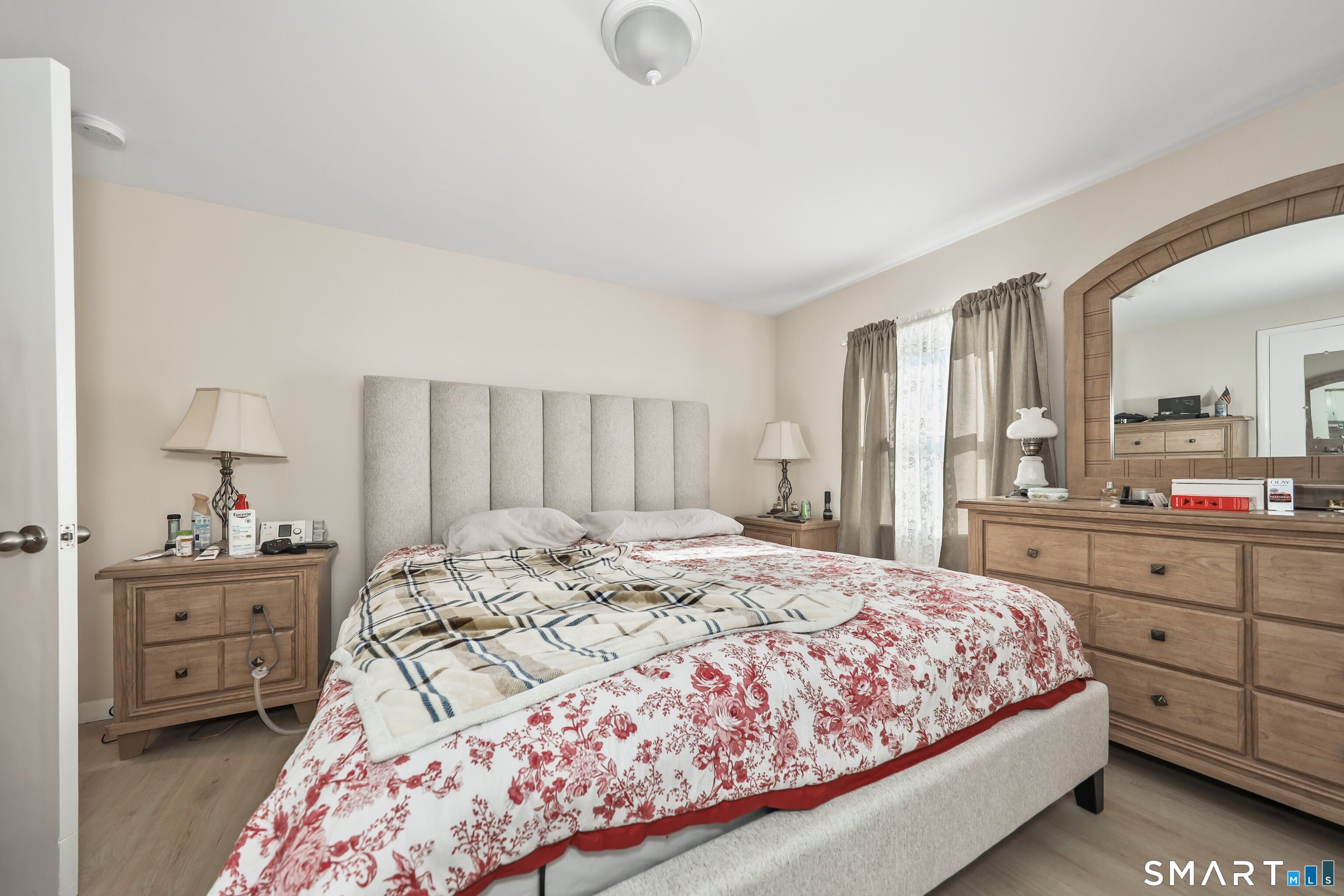 41 Sunnybrook Bend Waterbury, CT 06708 - Photo 18 of 29 a bedroom with a bed and a dresser