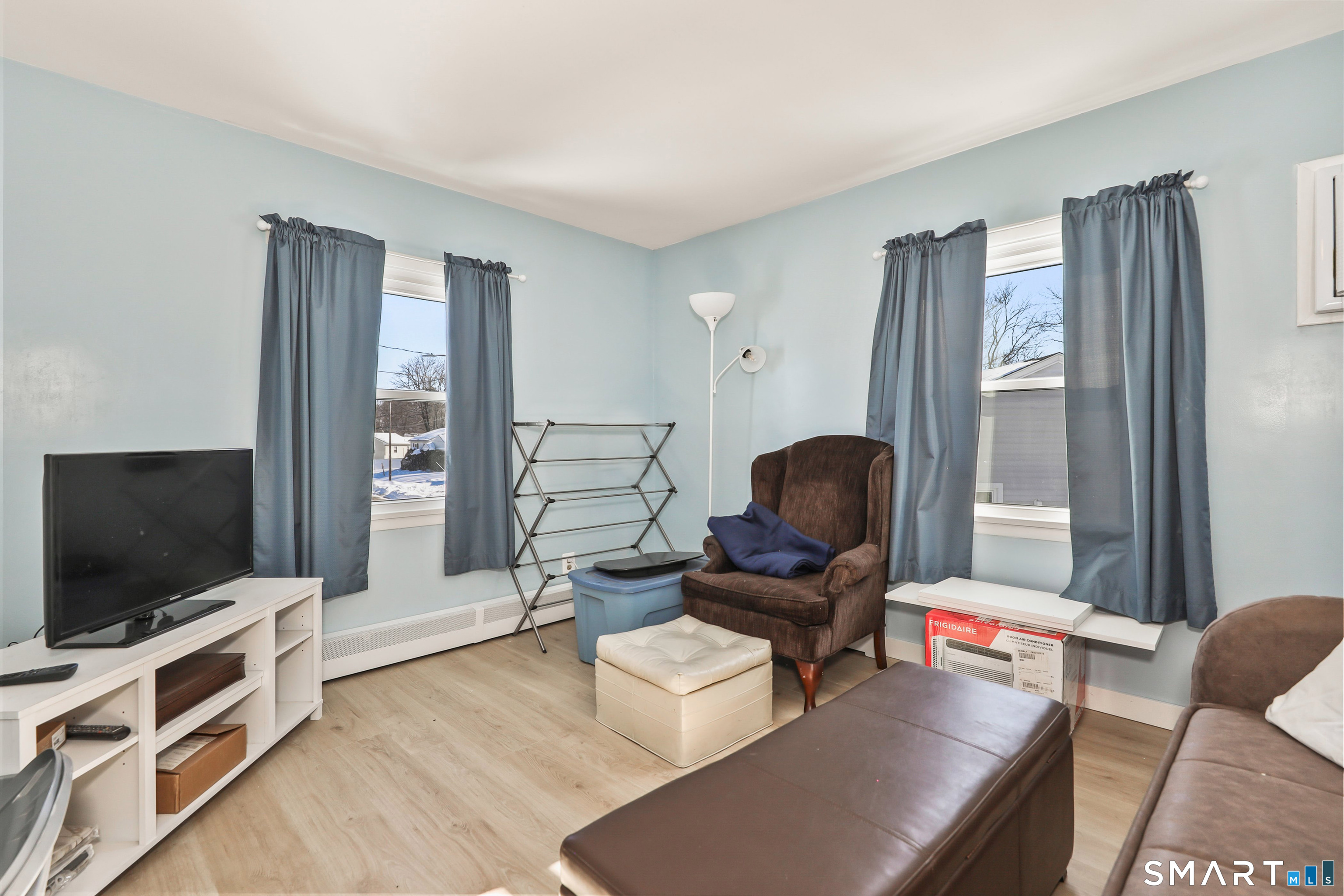 41 Sunnybrook Bend Waterbury, CT 06708 - Photo 19 of 29 a living room with furniture and a flat screen tv