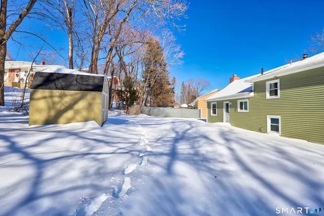 a view of a house with a snow