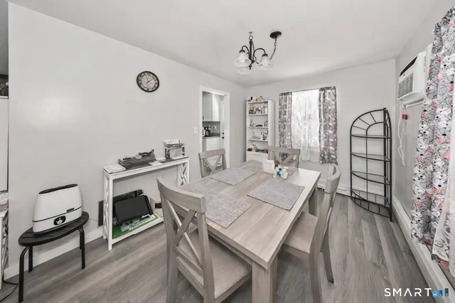 a view of a livingroom with furniture and window