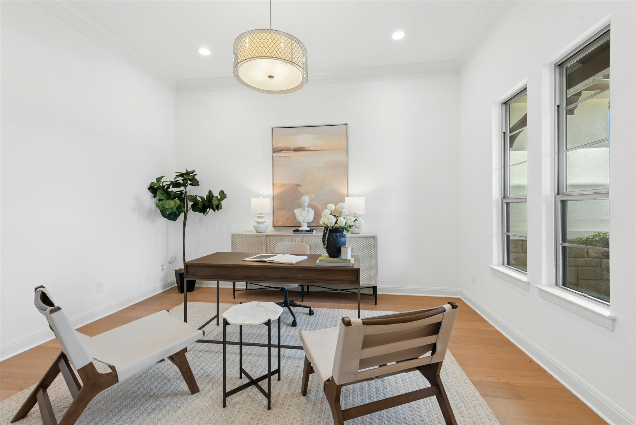 401 Brave Face Street Leander, TX 78641 - Photo 11 of 35 Office area featuring light wood-style flooring, crown molding, and recessed lighting