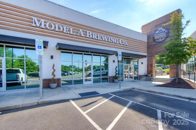 a building exterior with furniture