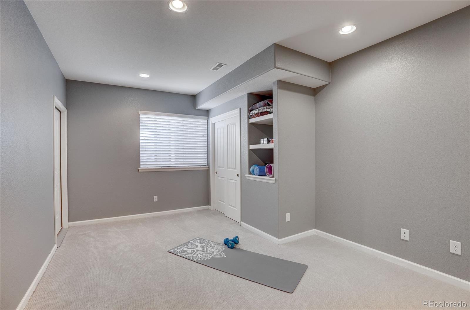 3563 Vestal Loop Broomfield, CO 80023 - Photo 33 of 38 a view of room with a ceiling fan and window
