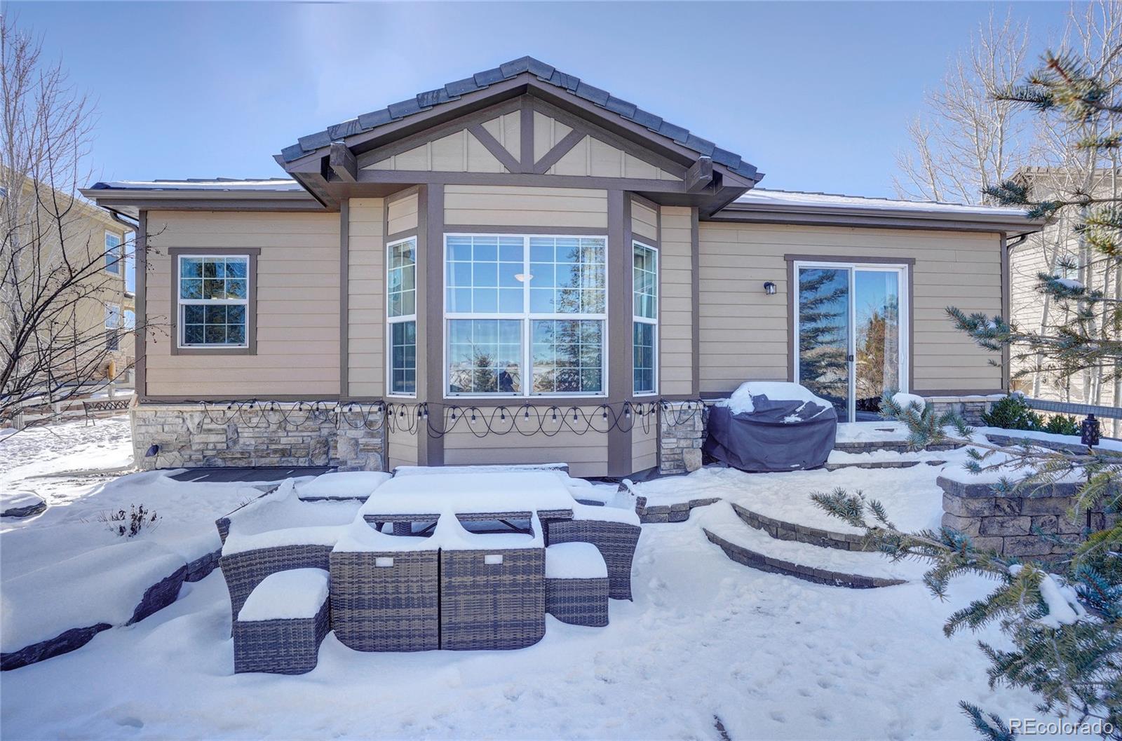 3563 Vestal Loop Broomfield, CO 80023 - Photo 37 of 38 a view of a house with backyard and sitting area