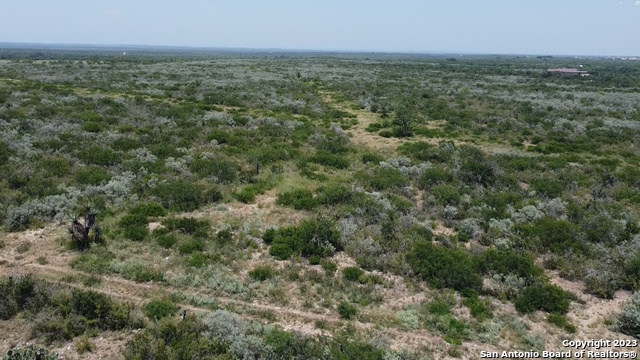 675 Legend Hills Uvalde, TX 78801 - Photo 8 of 14 an aerial view of residential houses with outdoor space and trees