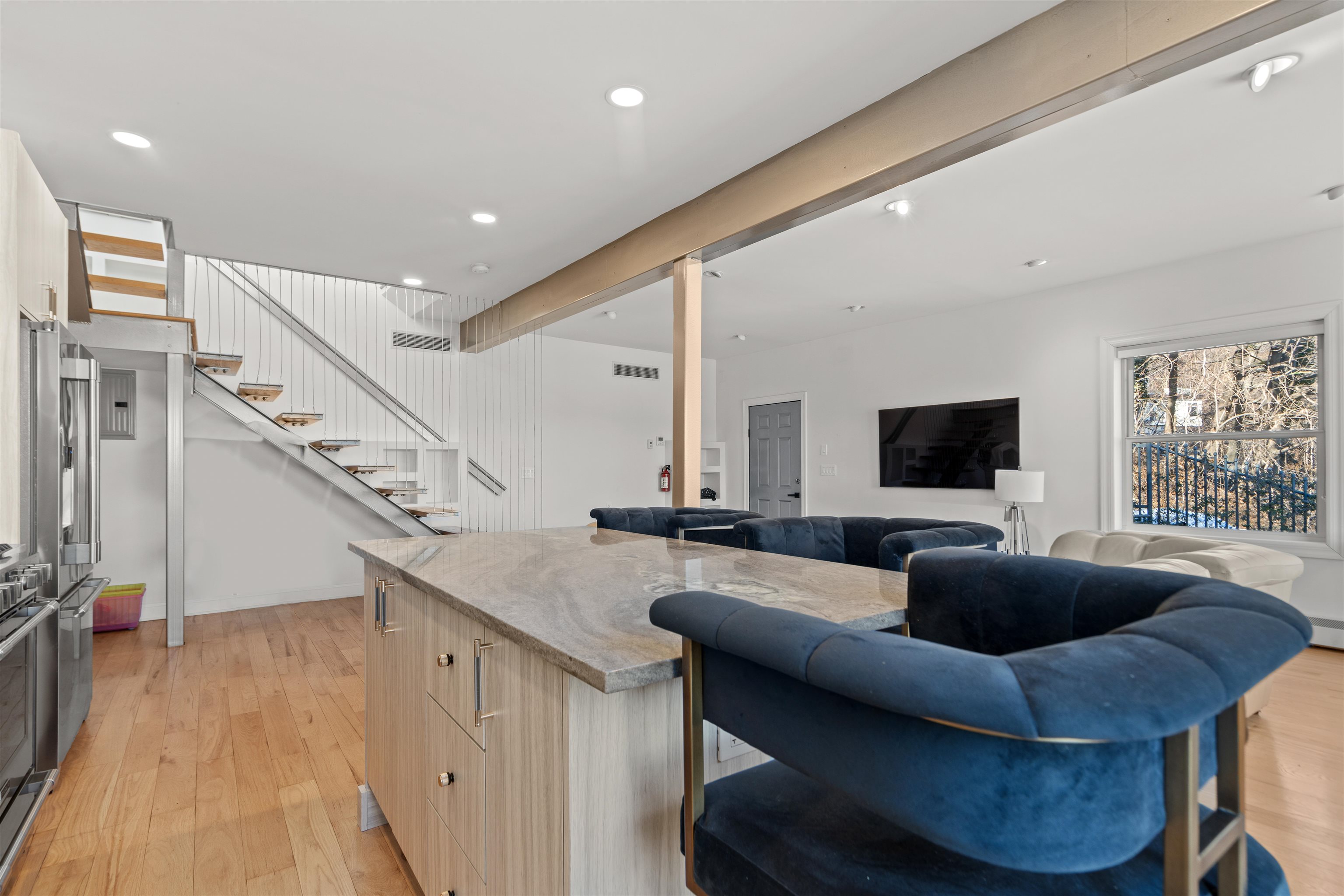9009 Riverside Place, Unit 3 North Bergen, NJ 07047 - Photo 12 of 18 a living room with furniture and a flat screen tv